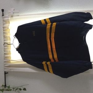 navy blue and yellow wind breaker from Charles River Apparel